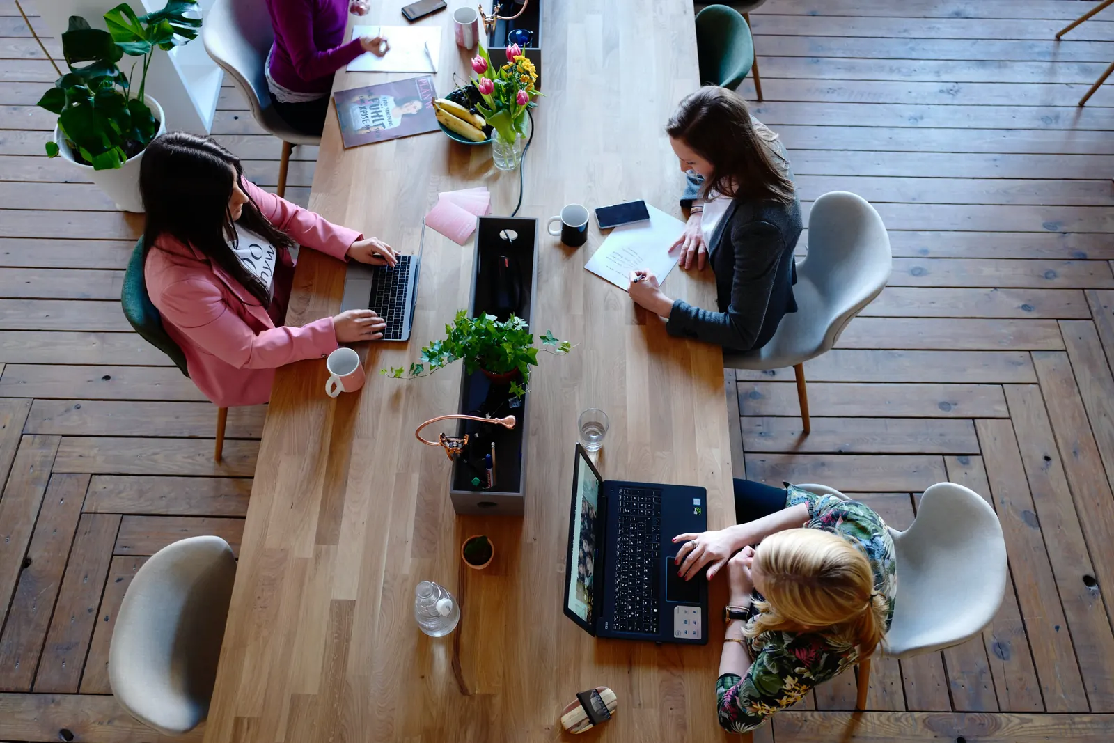 The Orange Identity team at work around a shared table